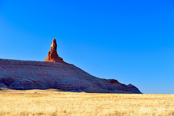 Stone lighthouse in the sea of grass